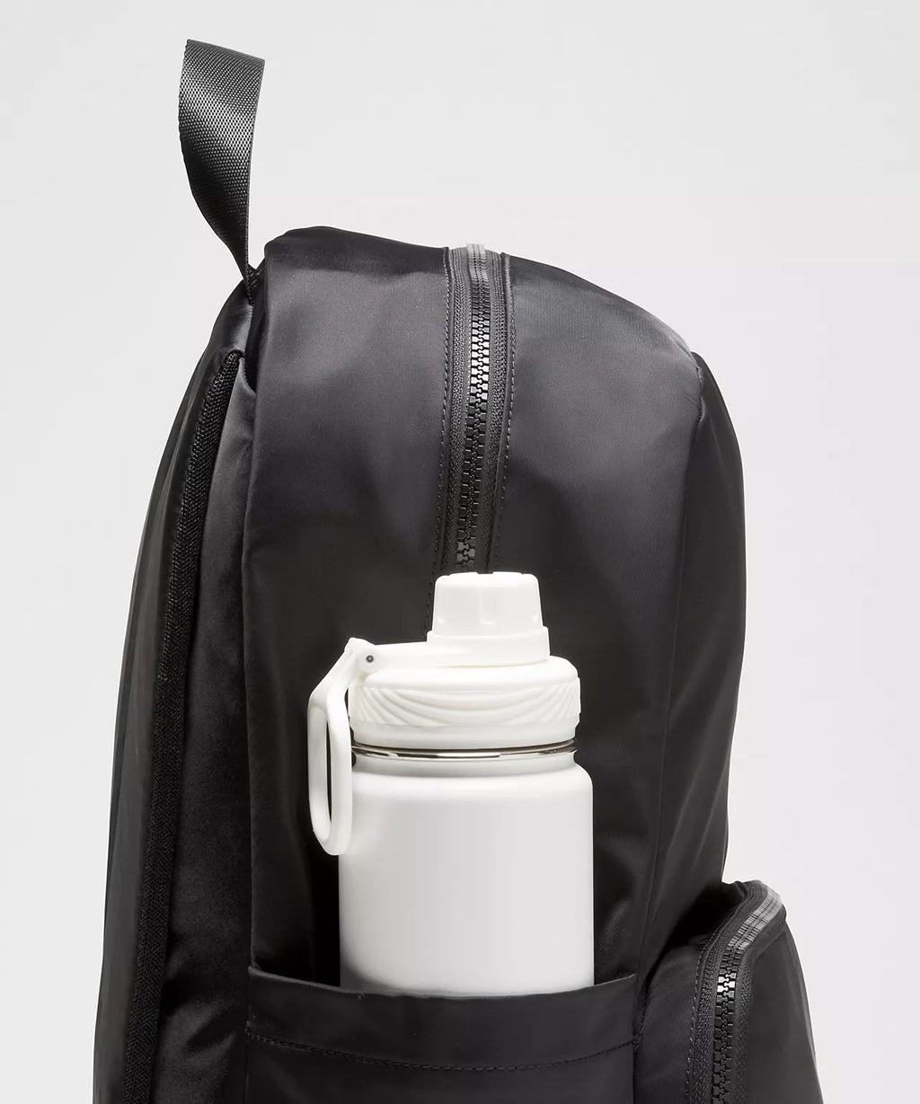 Everywhere Backpack 22L in black showing side bottle pocket