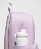 Everywhere Backpack 22L in pink showing side bottle pocket